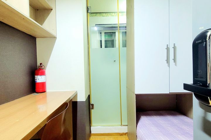 Unit 310: Studio-style room with an exterior  0th image