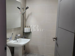 A room with a beautiful view and floor-to-cei 4th image