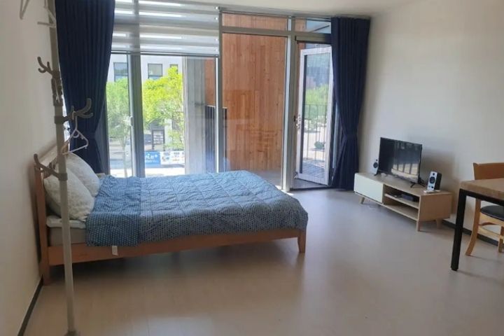 A glass-walled room with a terrace 12th image