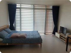 A glass-walled room with a terrace 8th image