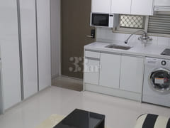 Fully furnished open-plan studio apartment 5th image