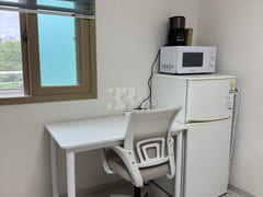 Studio apartment with a terrace near the back 3th image