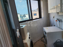 A clean house with good natural light. 10th image