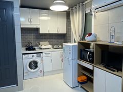A clean studio apartment. 0th image