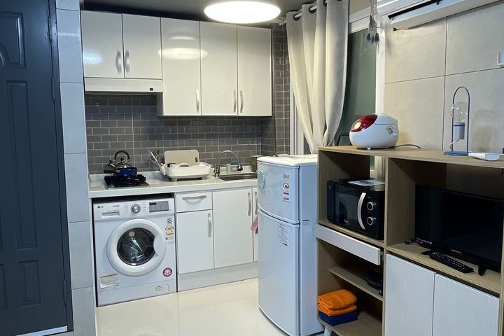 A clean studio apartment. 0th image