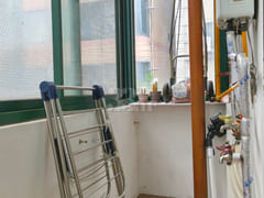A low-rise apartment building in a quiet, pea 6th image