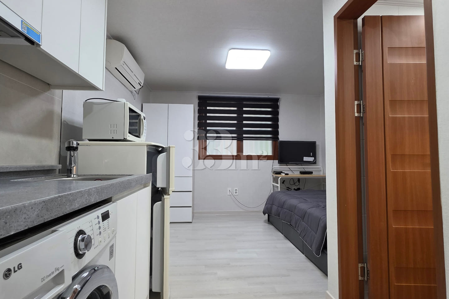 It is a neat studio apartment. 6th image