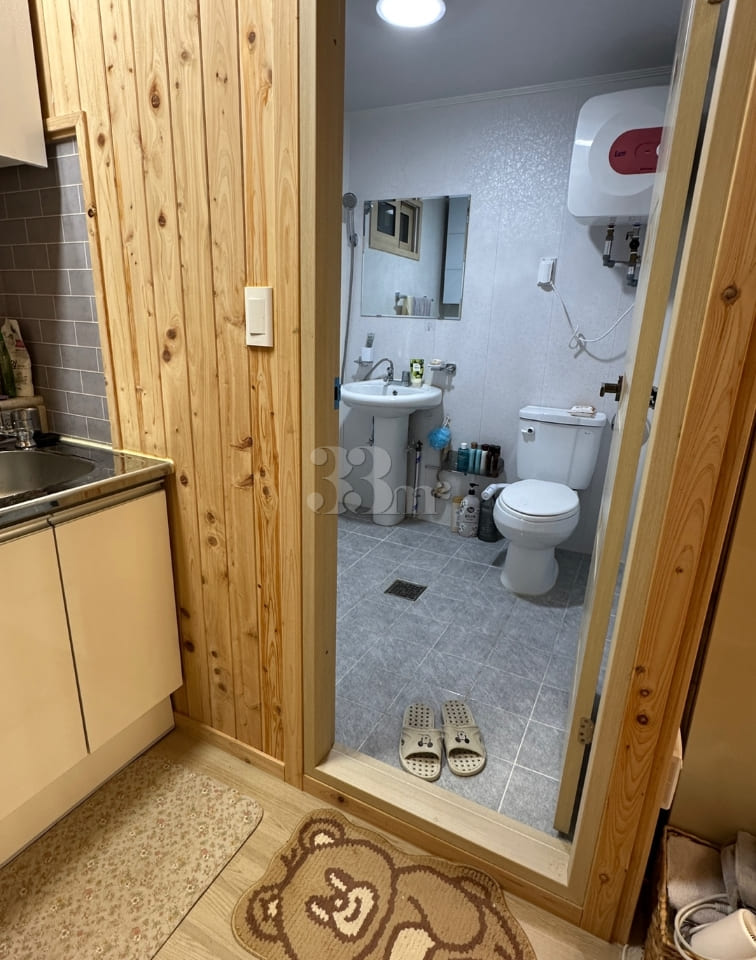 A room with a pretty garden in the forest. 9th image