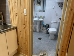 A room with a pretty garden in the forest. 9th image