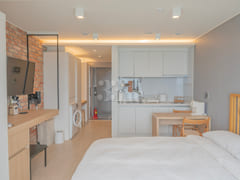 Jeju high-rise unit with full amenities and o 5th image