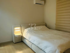 65-inch TV with separate bedroom and living r 15th image