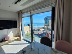 Fully furnished ocean view apartment in front 13th image