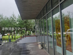 A room with a beautiful view and floor-to-cei 5th image