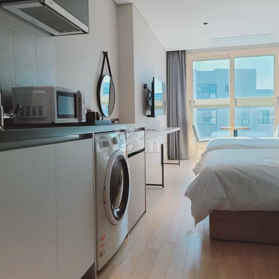 Top-floor hotel-style studio with a view of C 4th image