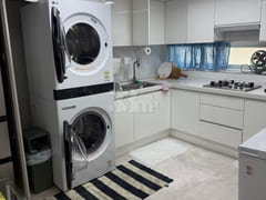 Hotel bedding, washer/dryer 11th image