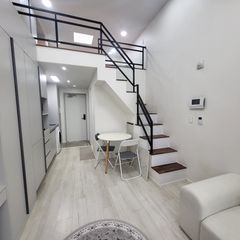 Duplex-style room with a terrace Unit Image