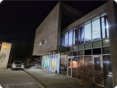 A glass-walled room with a terrace 5th image