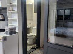 A room with a beautiful view and floor-to-cei 3th image