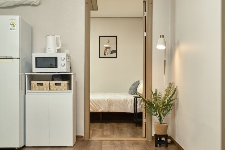 Fully furnished studio with a separate living 1th image