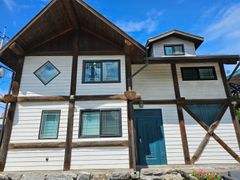 Two-story log cabin 19th image