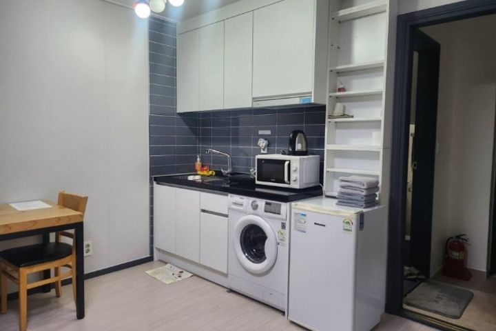 A glass-walled room with a terrace 14th image