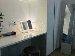 65-inch TV with separate bedroom and living r 17th image