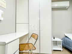 Newly remodeled white-toned room 3th image