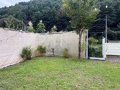 A stylish detached house in front of a valley 2th image