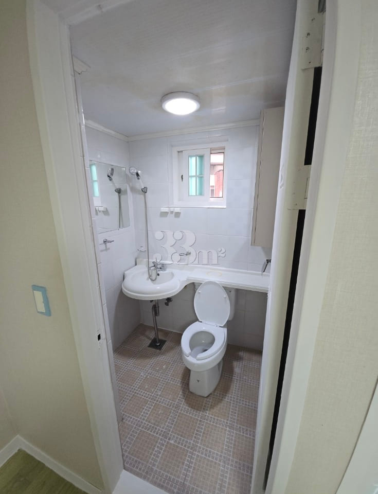 A stylish and neat studio apartment 4th image