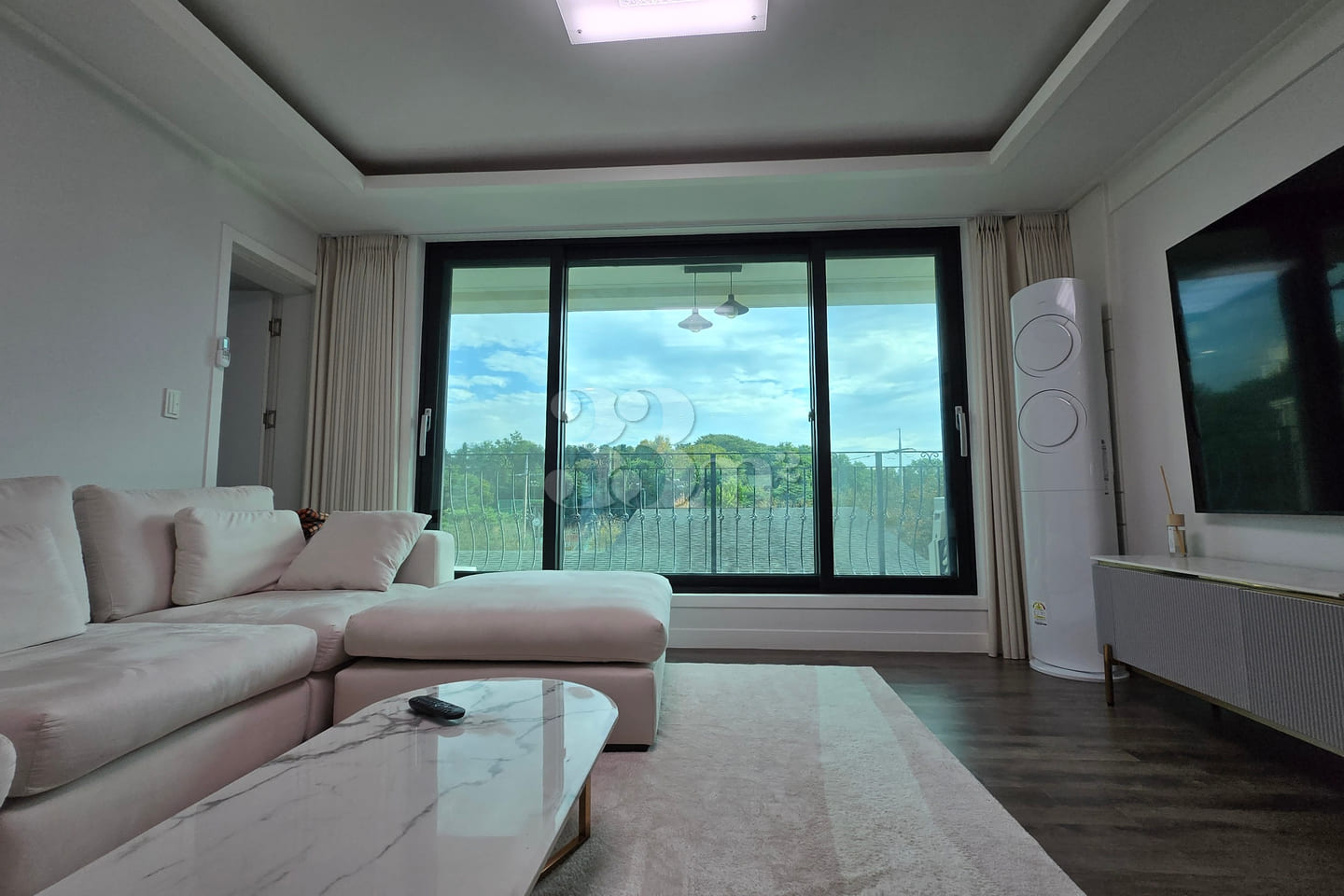 3rd-floor unit facing a park with a forest vi 17th image
