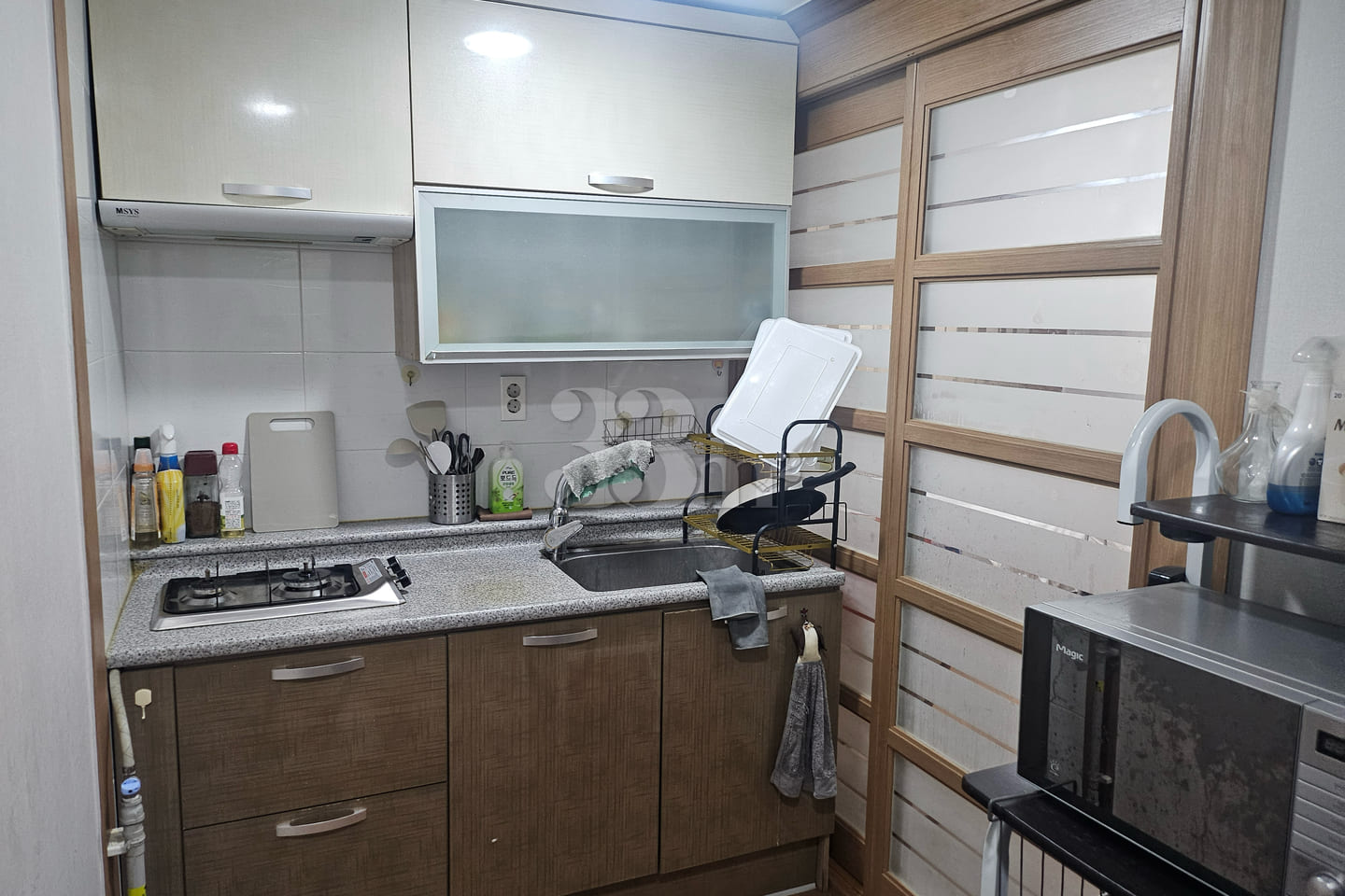 It is a studio apartment with a kitchen. 4th image