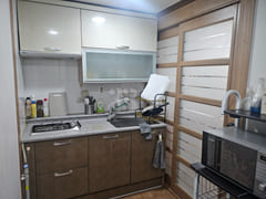 It is a studio apartment with a kitchen. 4th image