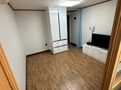 Clean, fully furnished apartment in front of 3th image