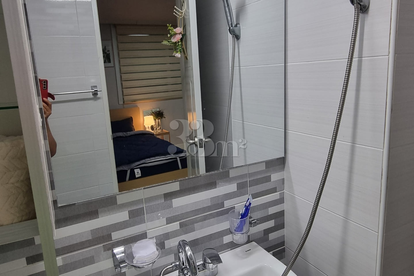 It is a neat, newly built room. 15th image