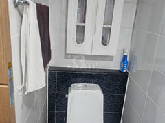 It is a studio apartment with a kitchen. 6th image