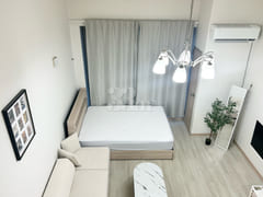 Two-bedroom duplex with a connecting path to 2th image