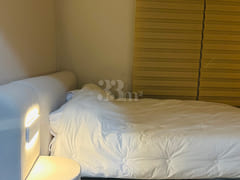65-inch TV with separate bedroom and living r 6th image