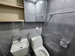 Clean white and gray studio apartment 6th image