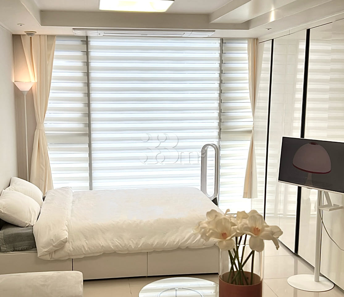 Clean and bright white room with natural ligh 0th image
