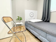 Newly remodeled white-toned room 0th image