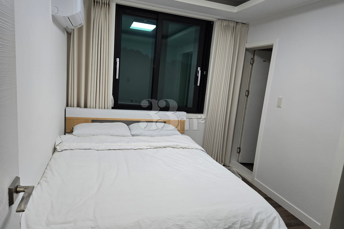 3rd-floor unit facing a park with a forest vi 4th image