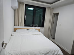 3rd-floor unit facing a park with a forest vi 4th image