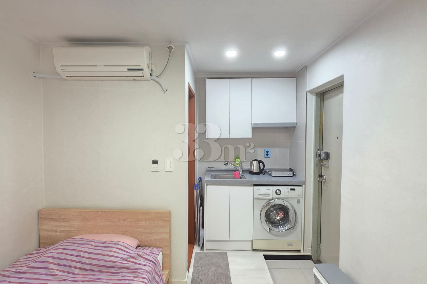 It is a neat studio apartment. 2th image