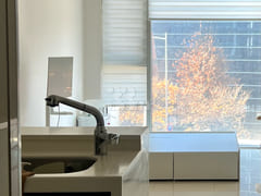 Clean and bright white room with natural ligh 1th image