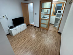 Clean, fully furnished apartment in front of 0th image