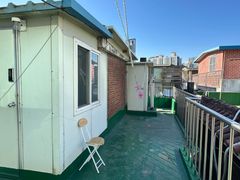 A spacious rooftop house 4th image