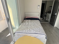 Fully furnished white-themed room in Junghwas 2th image