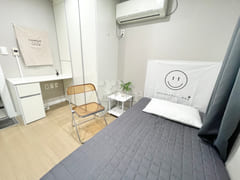 Newly remodeled white-toned room 2th image