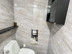 Fully furnished white-themed room in Junghwas 11th image