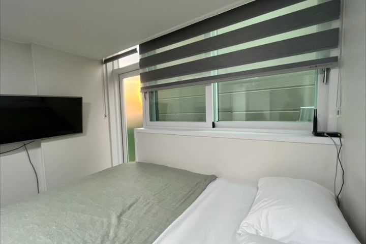 Studio apartment with a balcony 9th image